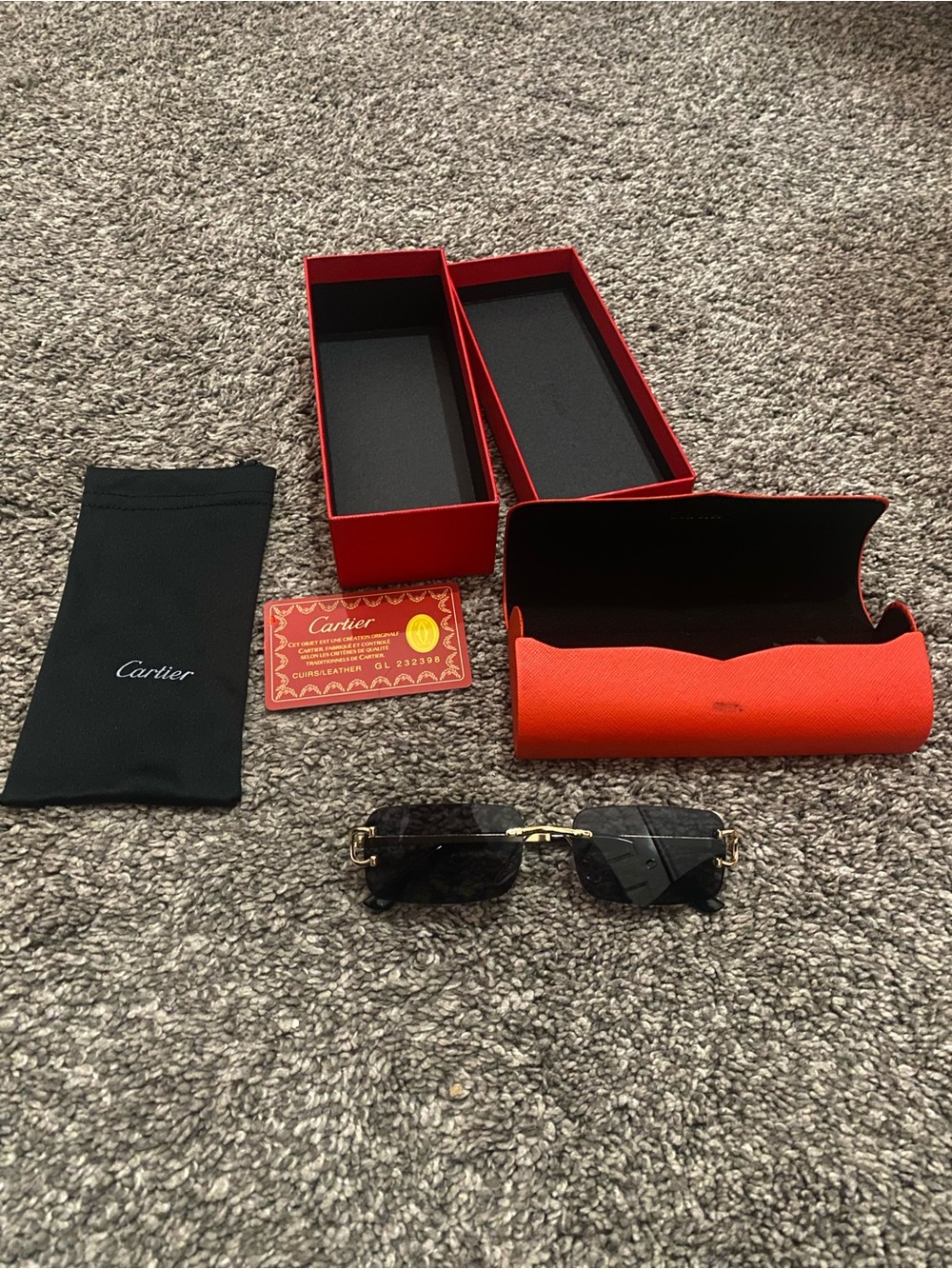 Cartier Rimless Sunglasses with Gold Accents and Black Lenses